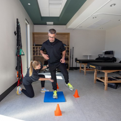 Dr. Jessica Jones helps patient with gait training
